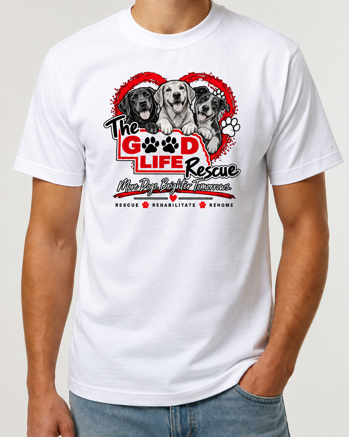 A man wearing a white short-sleeve graphic T-shirt with a red, black, and gray print featuring three dogs and the text 'The Good Life Rescue' and 'Five Dog Rescue Foundation.'.