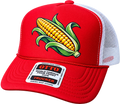 A red and white trucker hat featuring a large graphic of a yellow corn cob with green leaves on the front panel. The brim has a white sticker that reads 'OTTO WORLD FAMOUS FOAM FRONT OSM TRUCKER'.